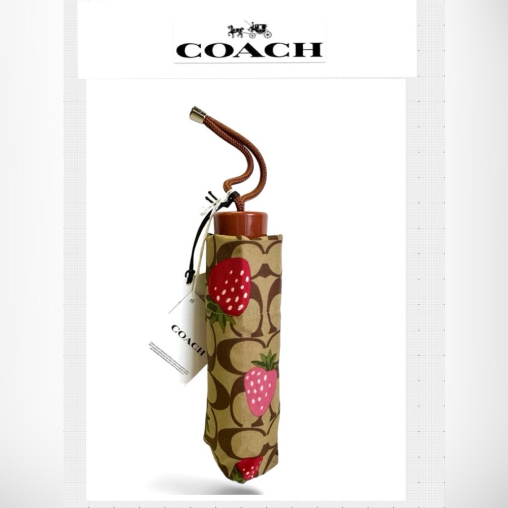 Coach Mini Umbrella In Signature Wild
Strawberry Print. UV Protection CI017. NWT - Picture 6 of 6